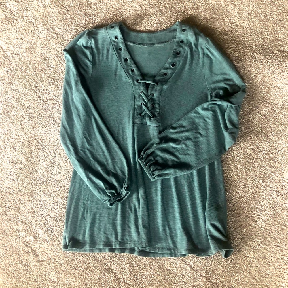 Women’s light green tunic, v neck with braided neckline